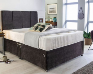 A Single Divan bed base in black color with mattress