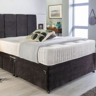 A Single Divan bed base in black color with mattress