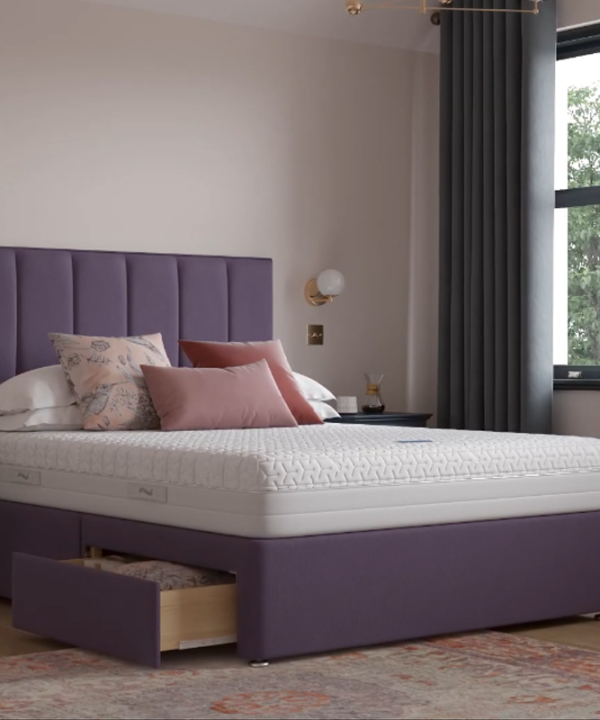 A double divan with drawers, mattress and headboard